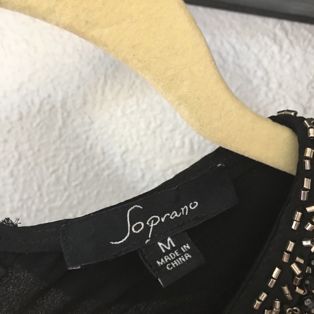 Black sleeveless blouse